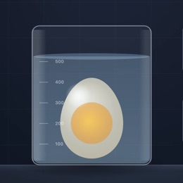 De-shelled egg in a beaker